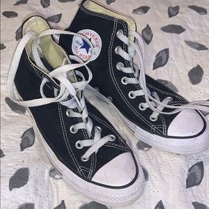 Black and white high top converse